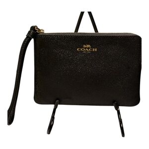 Like New Coach Corner Black leather Zip-up closure wristlet clutch purse